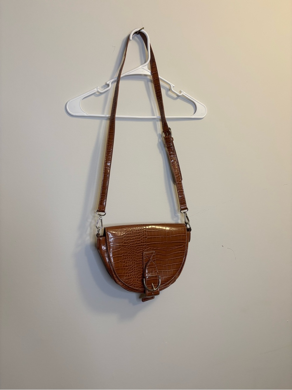 Urban Outfitters Brown Croc-Embossed Saddle Crossbody Bag